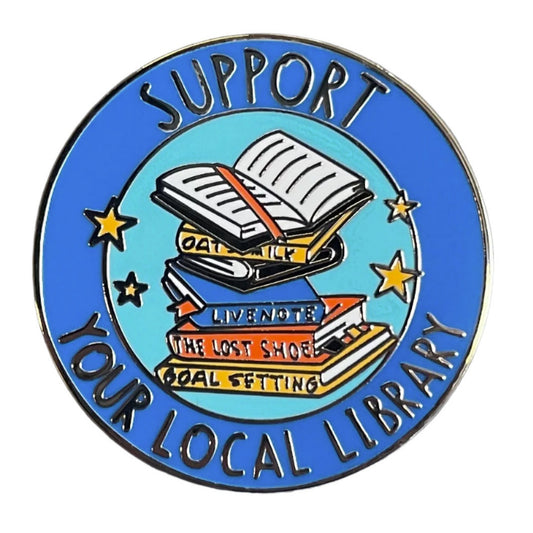 support your local library written in a circle around a stack of books