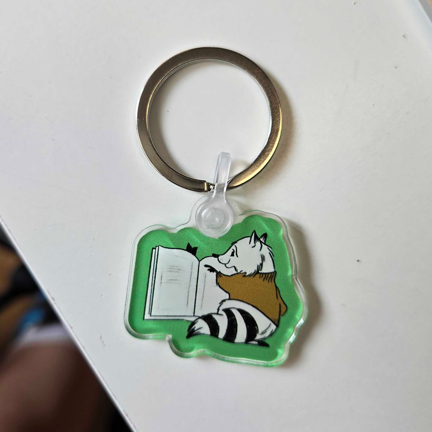 Forest of Reading – Raccoon Keychain